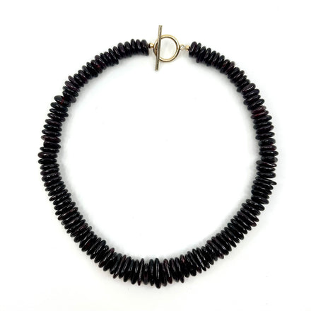 Elegant garnet choker by rraine featuring rich garnet beads and a gold-filled clasp, measuring 15 inches in length