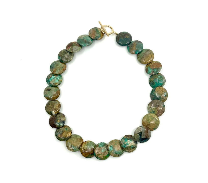 Turquoise choker with a 15.5'' gold-filled clasp, featuring polished turquoise beads.