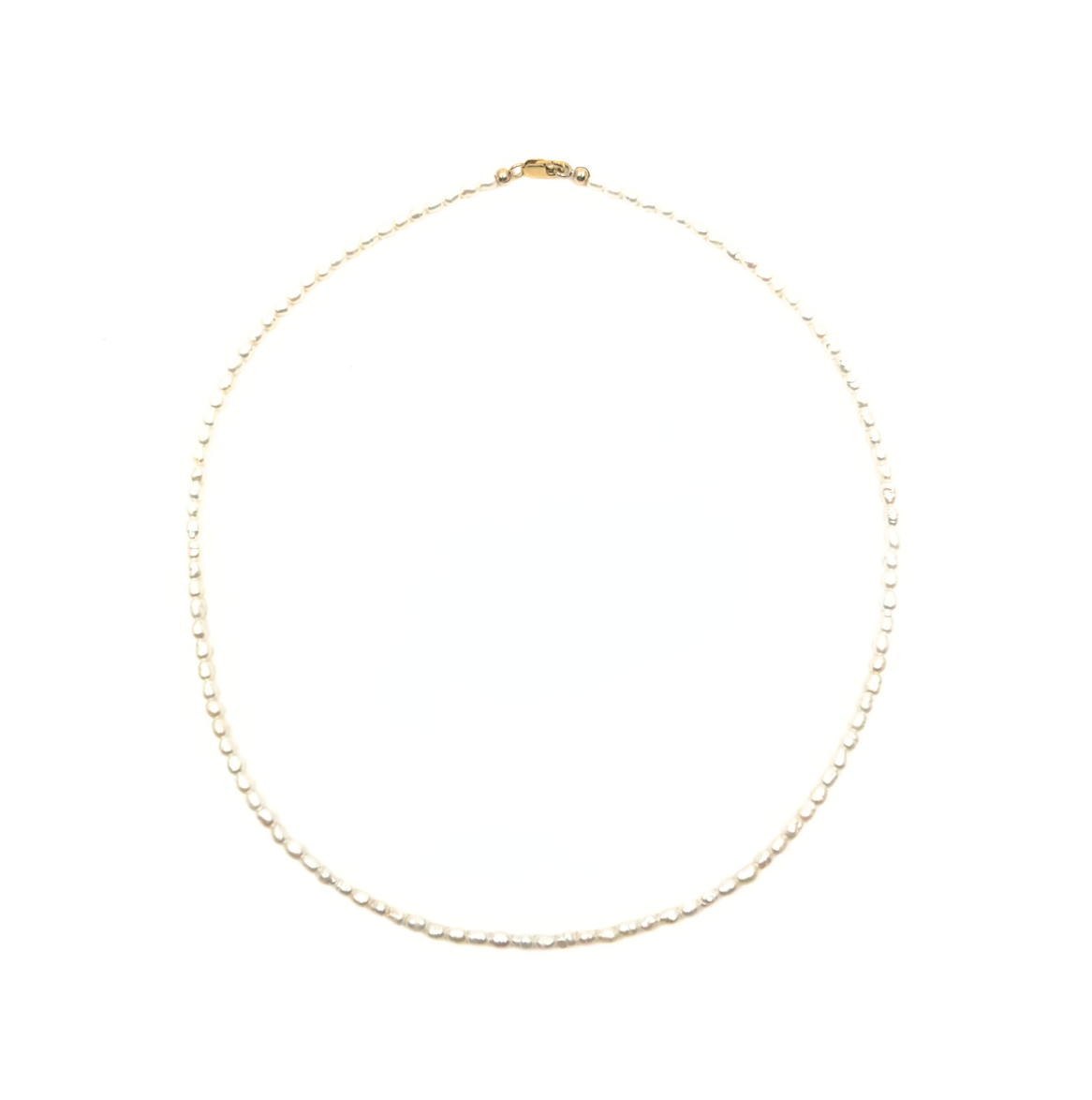 Thin pearl choker featuring 2.5-3mm freshwater pearls with a gold-filled clasp, available in 14'', 15'', and 16'' lengths.