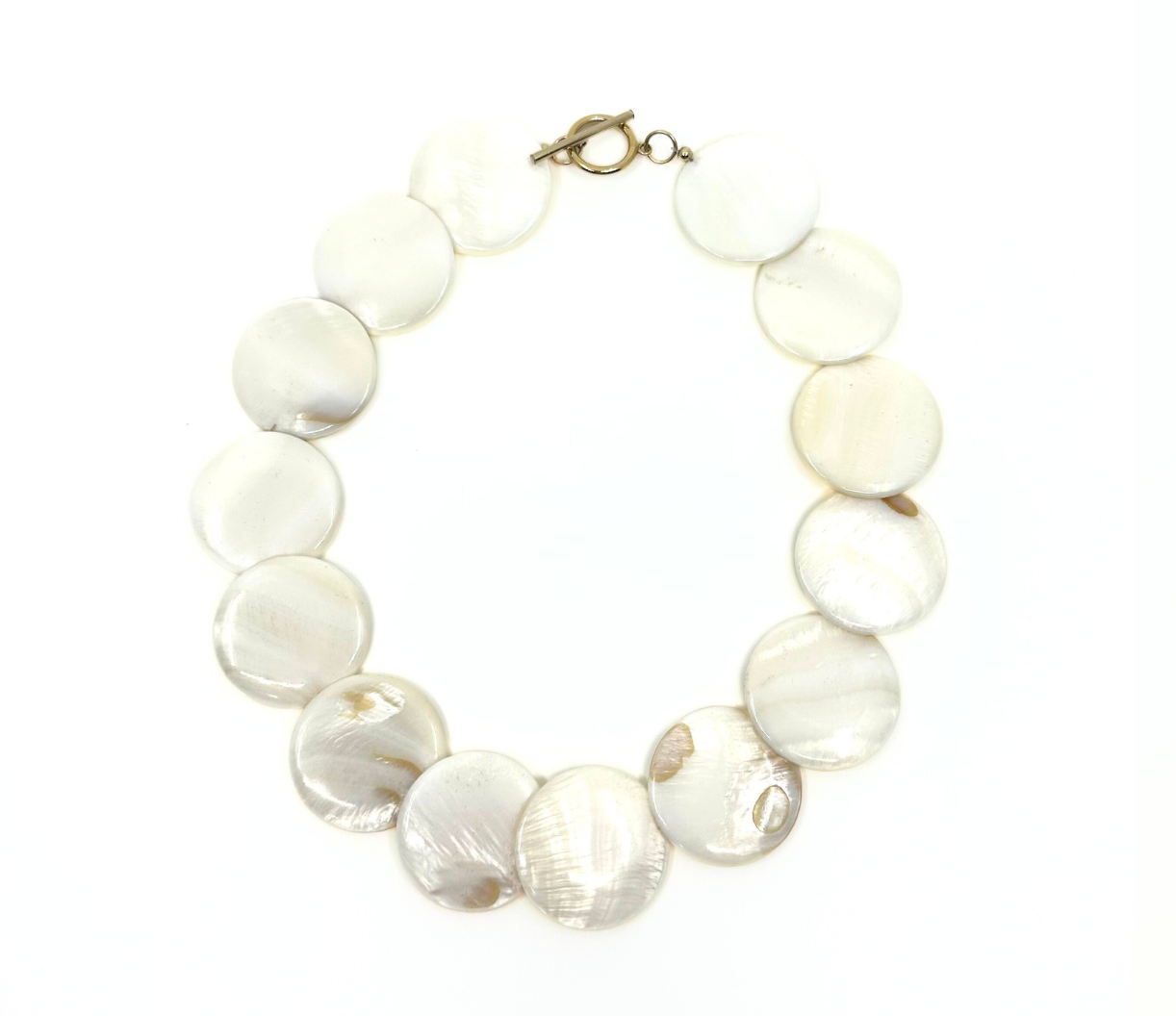 Shell choker by rraine featuring large shell beads and a gold-filled clasp, measuring 16.5 inches in length.