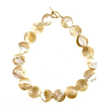 Small shell choker with a 15'' gold-filled clasp, featuring round, polished shell beads.